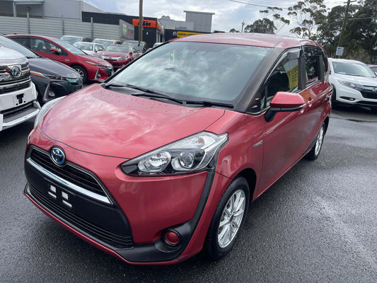 2016 Toyota Sienta 1.5L Hybrid G Package, red exterior, parked in dealership lot, showcasing its modern design and features.