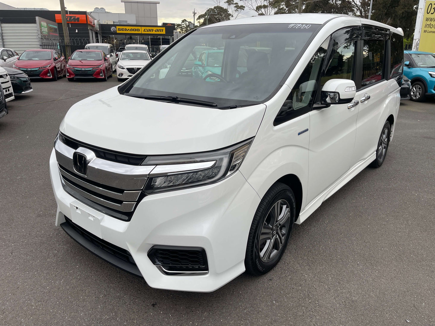 2018 Honda Honda Stepwgn 2.0 Spada Hybrid G Honda Sensing in white color, showcasing modern design and spacious interior.