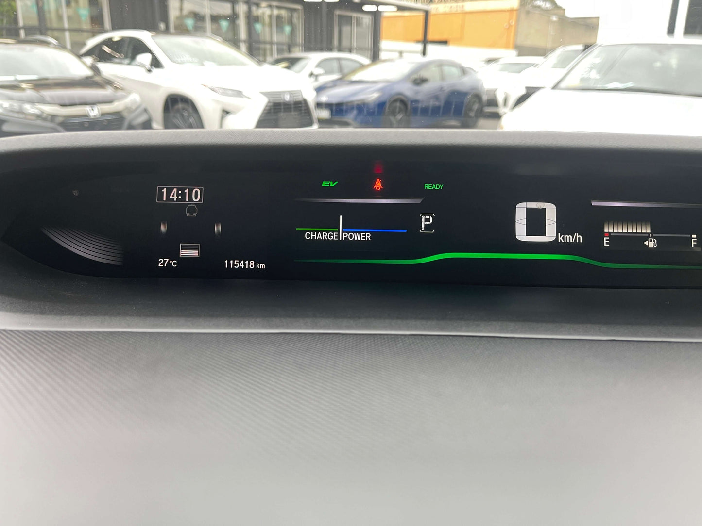 Dashboard display of the 2018 Honda Honda Stepwgn 2.0 Spada Hybrid with charge power indicator.