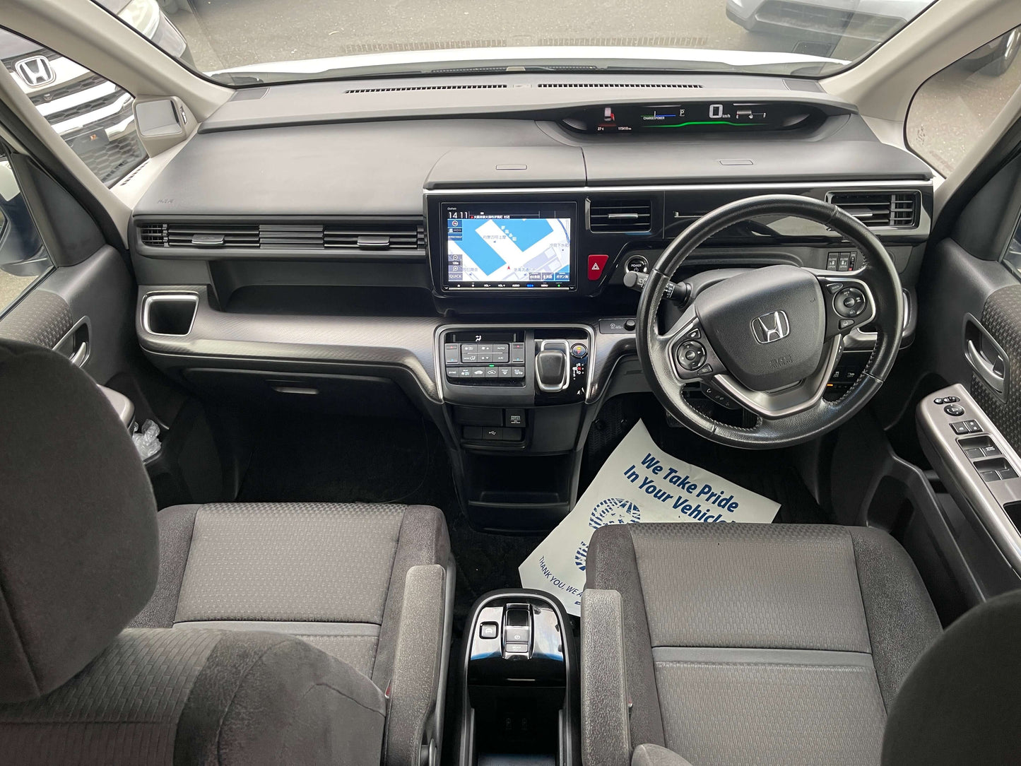 Interior view of the 2018 Honda Honda Stepwgn 2.0 Spada Hybrid featuring modern dashboard and seating.