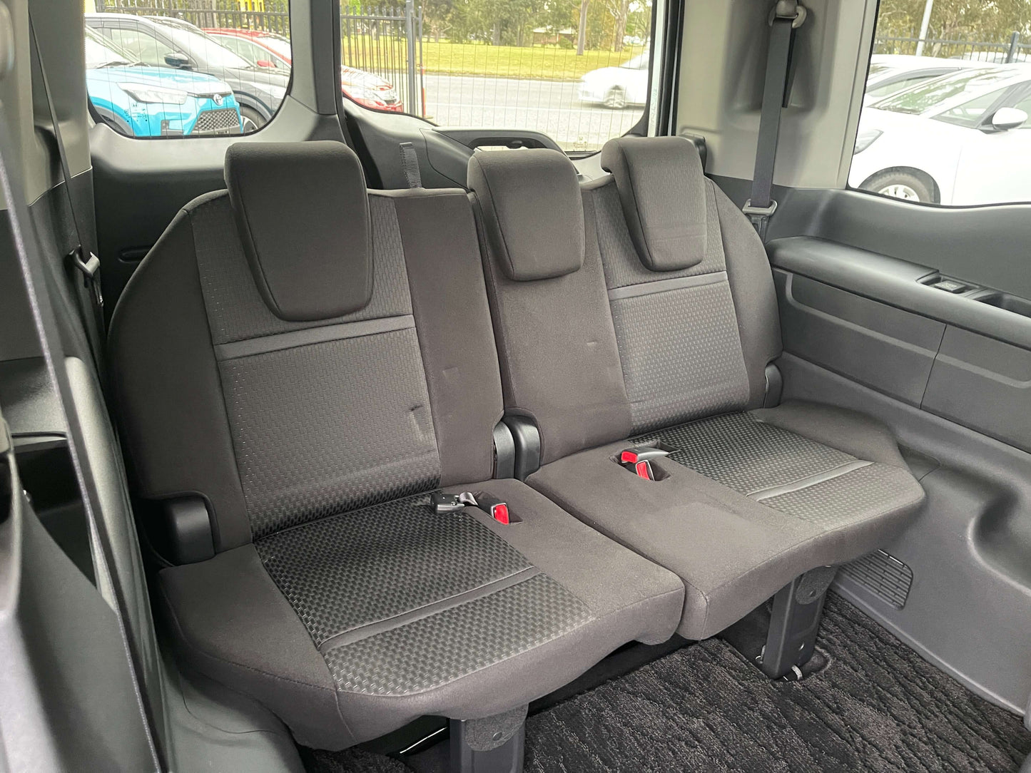 Interior view of the rear seats in the 2018 Honda Honda Stepwgn 2.0 Spada Hybrid, featuring 7-seater configuration.