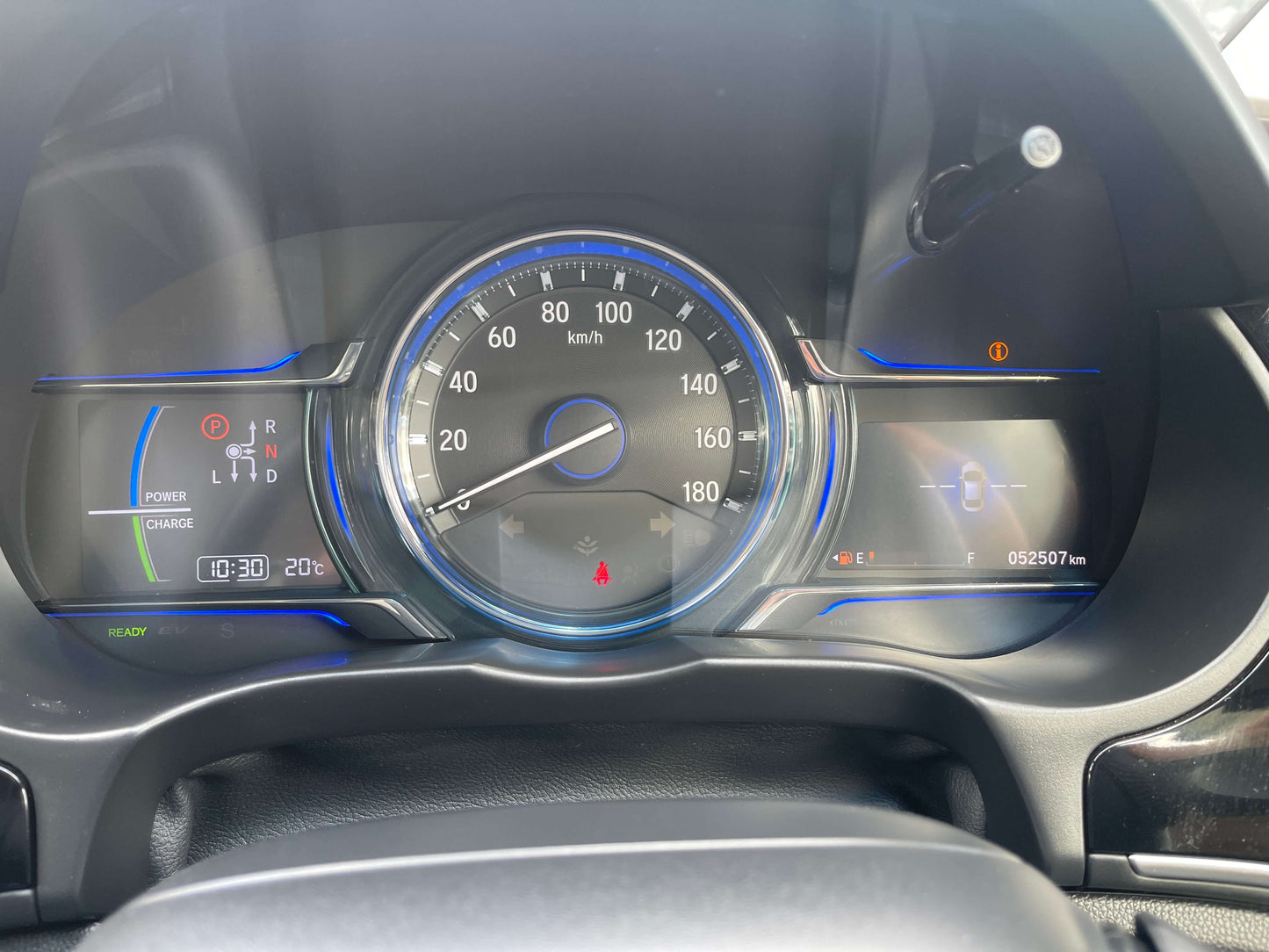2015 Honda Grace 1.5 Hybrid dashboard with speedometer, odometer showing 052507 km, and hybrid indicators.