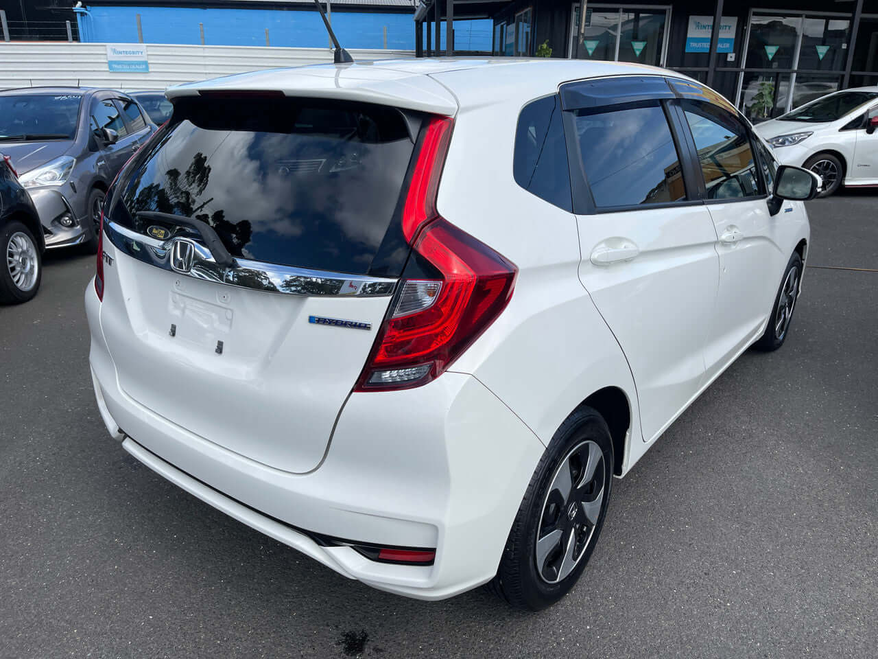 2017 Honda Fit 1.5L Hybrid 5 seater, rear view showcasing its sleek design and modern features.