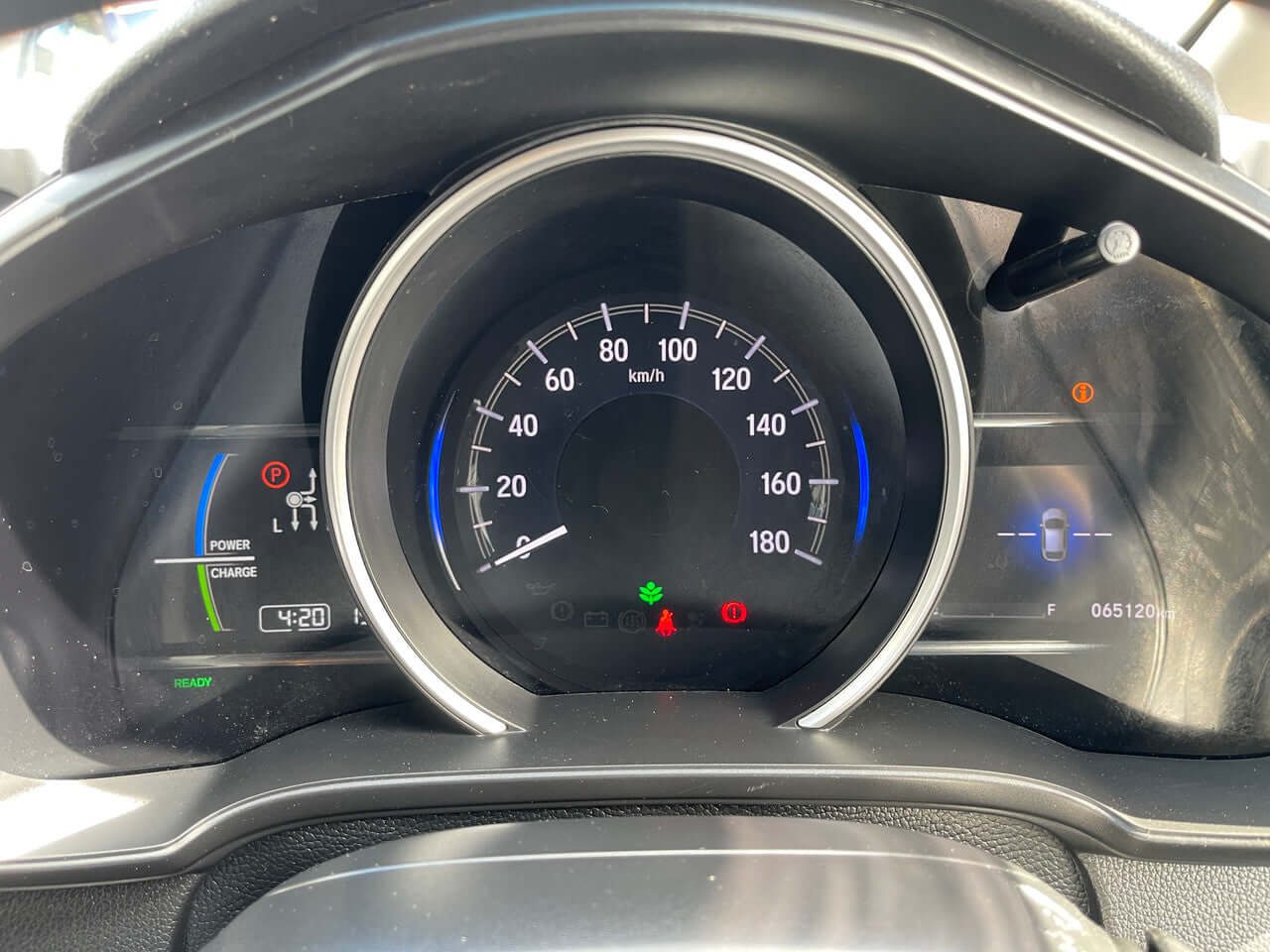 2017 Honda Fit 1.5L Hybrid dashboard display showing speedometer and hybrid indicators.
