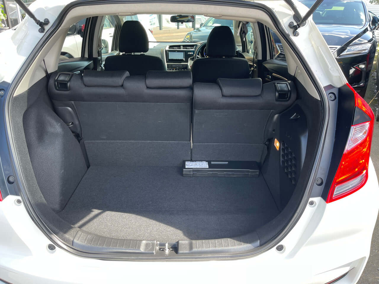 2017 Honda Fit 1.5L Hybrid spacious trunk with ample storage for everyday needs.