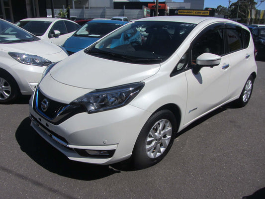 2017 Nissan Note e-Power G Edition hybrid car in white, showcasing its modern design and features.