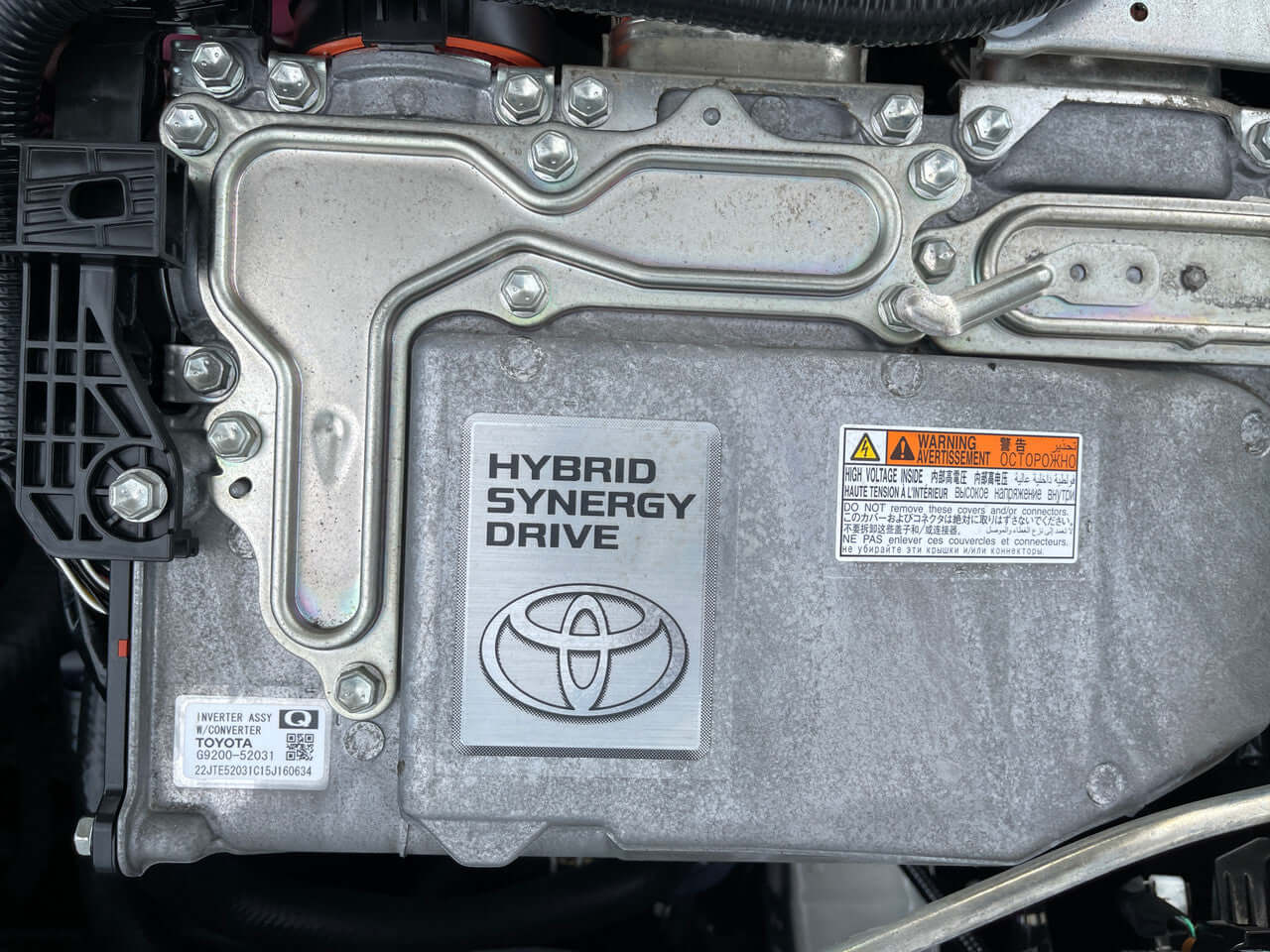 Hybrid Synergy Drive system in 2015 Toyota Corolla Axio Hybrid 1.5L Sedan engine compartment.
