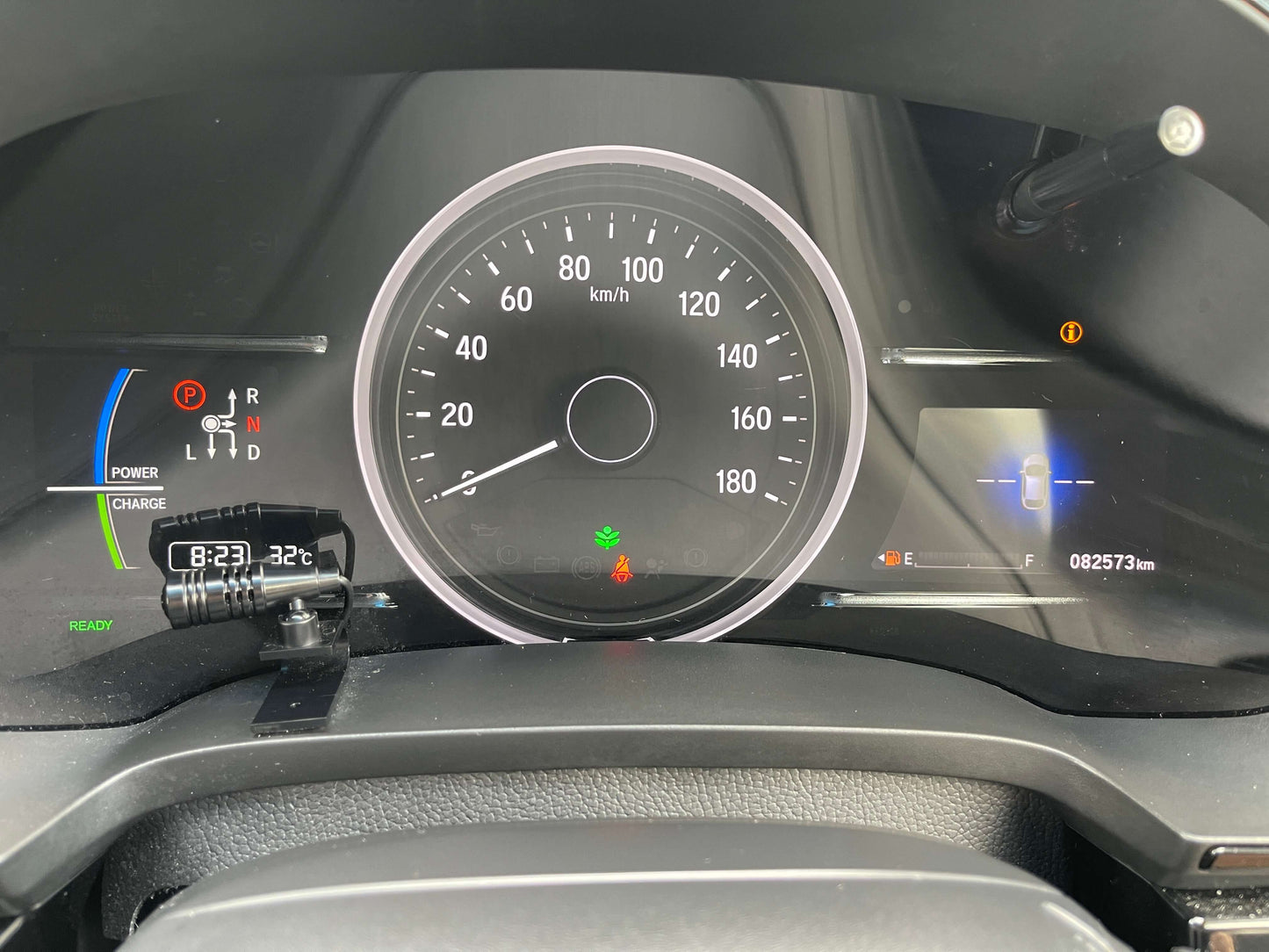 Dashboard display of 2019 Honda Shuttle 1.5L 4WD Hybrid showing speed and fuel metrics.