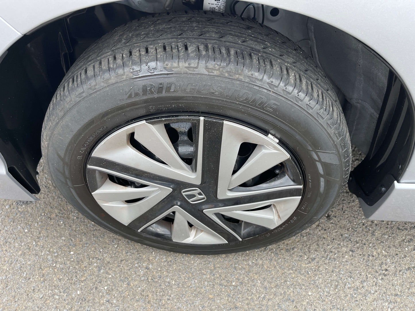 2019 Honda Shuttle 1.5L 4WD Hybrid tire close-up showcasing wheel design and tread detail