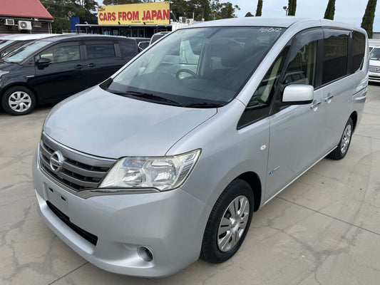 2012 Nissan Serena 2.0L S-Hybrid Highway Star, a silver MPV parked, showcasing its sleek design.