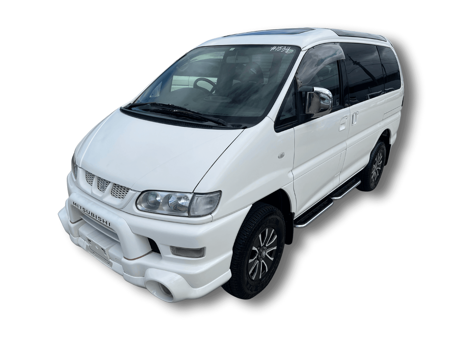 4WD cars from Japan - white Japanese import van, showcasing reliability and adventure-ready performance.
