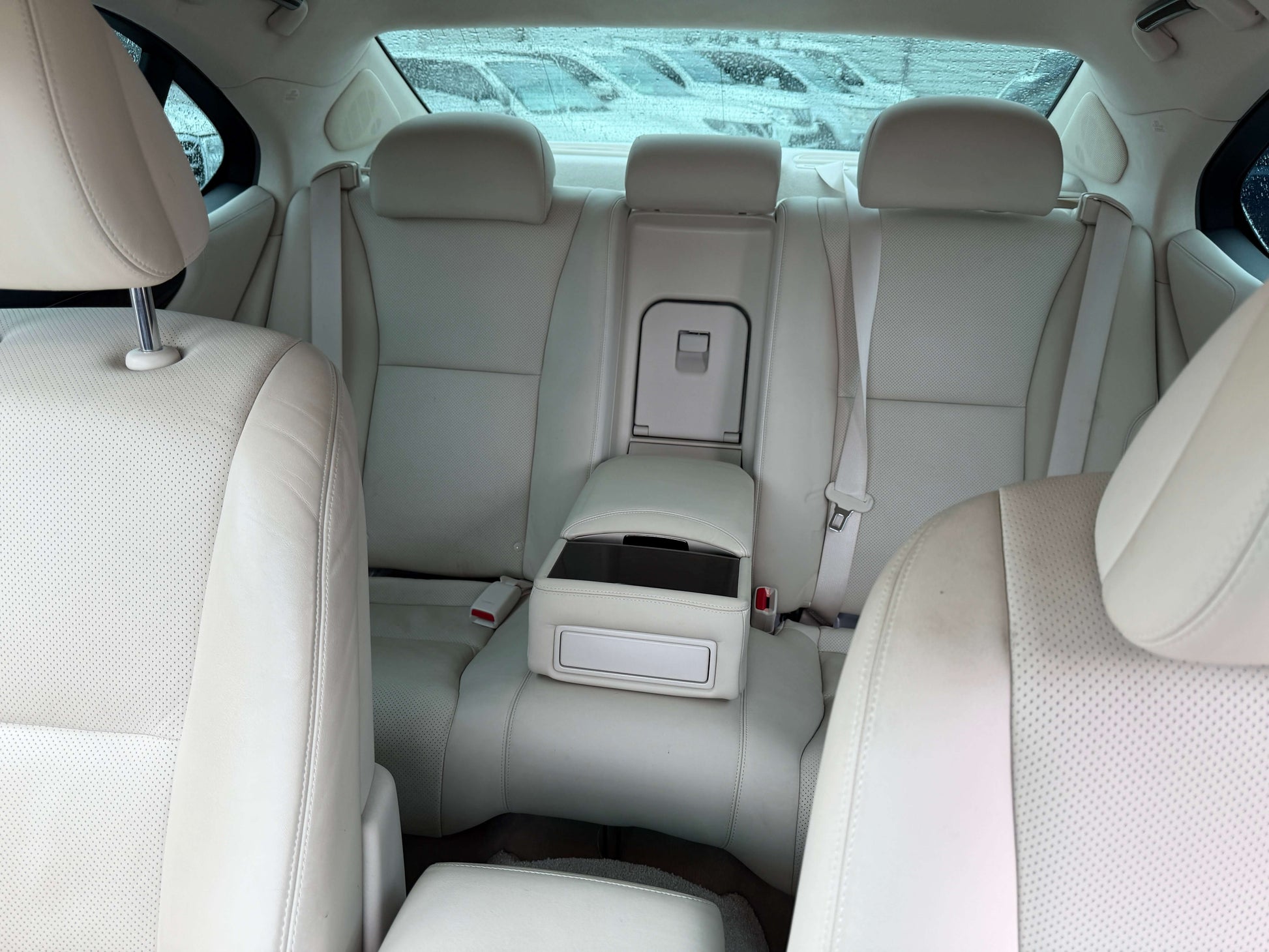 2007 Lexus LS600h AWD V8 5.0L Hybrid interior view showing luxurious beige leather seating.