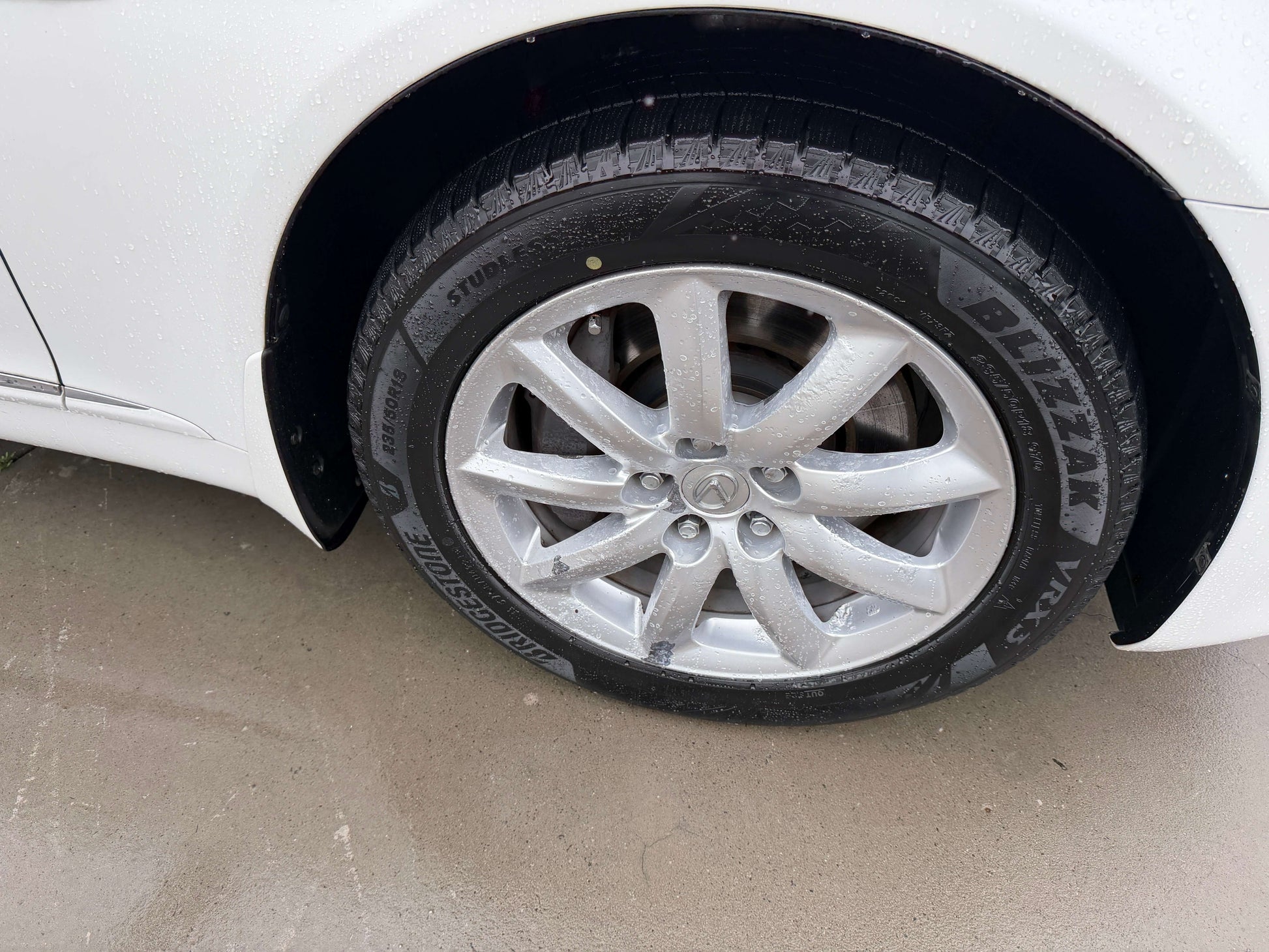 Close-up of the wheel and tire of a 2007 Lexus LS600h AWD V8 5.0L Hybrid luxury sedan showing detail and tread.