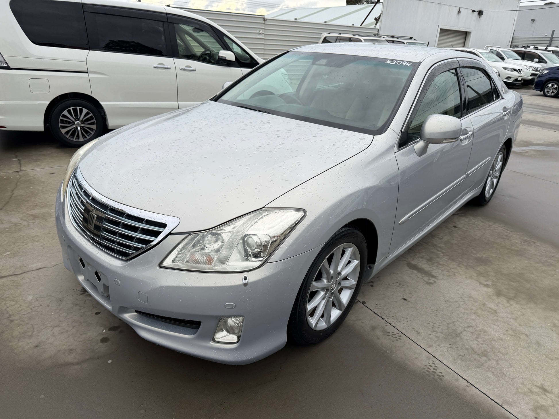 2008 Toyota Crown V6 3.0L Royal Saloon G-Edition Luxury Sedan in silver color, showing the front and side view, #2094.