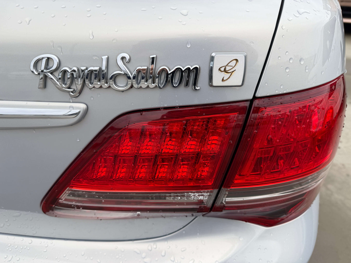 2008 Toyota Crown V6 3.0L Royal Saloon badge and rear light detail of luxury sedan