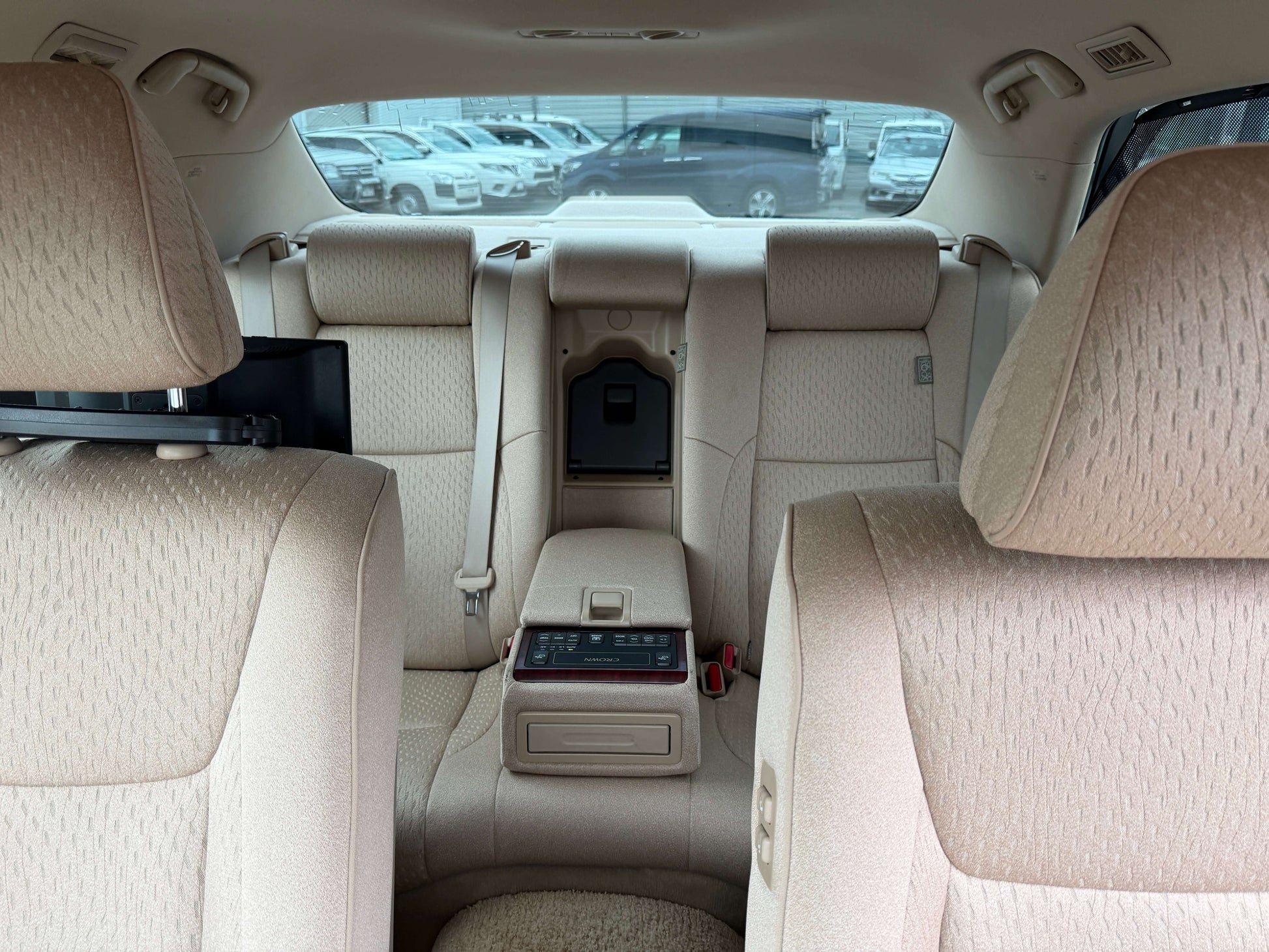 Interior view of the 2008 Toyota Crown V6 3.0L Royal Saloon Luxury Sedan showing spacious back seats.
