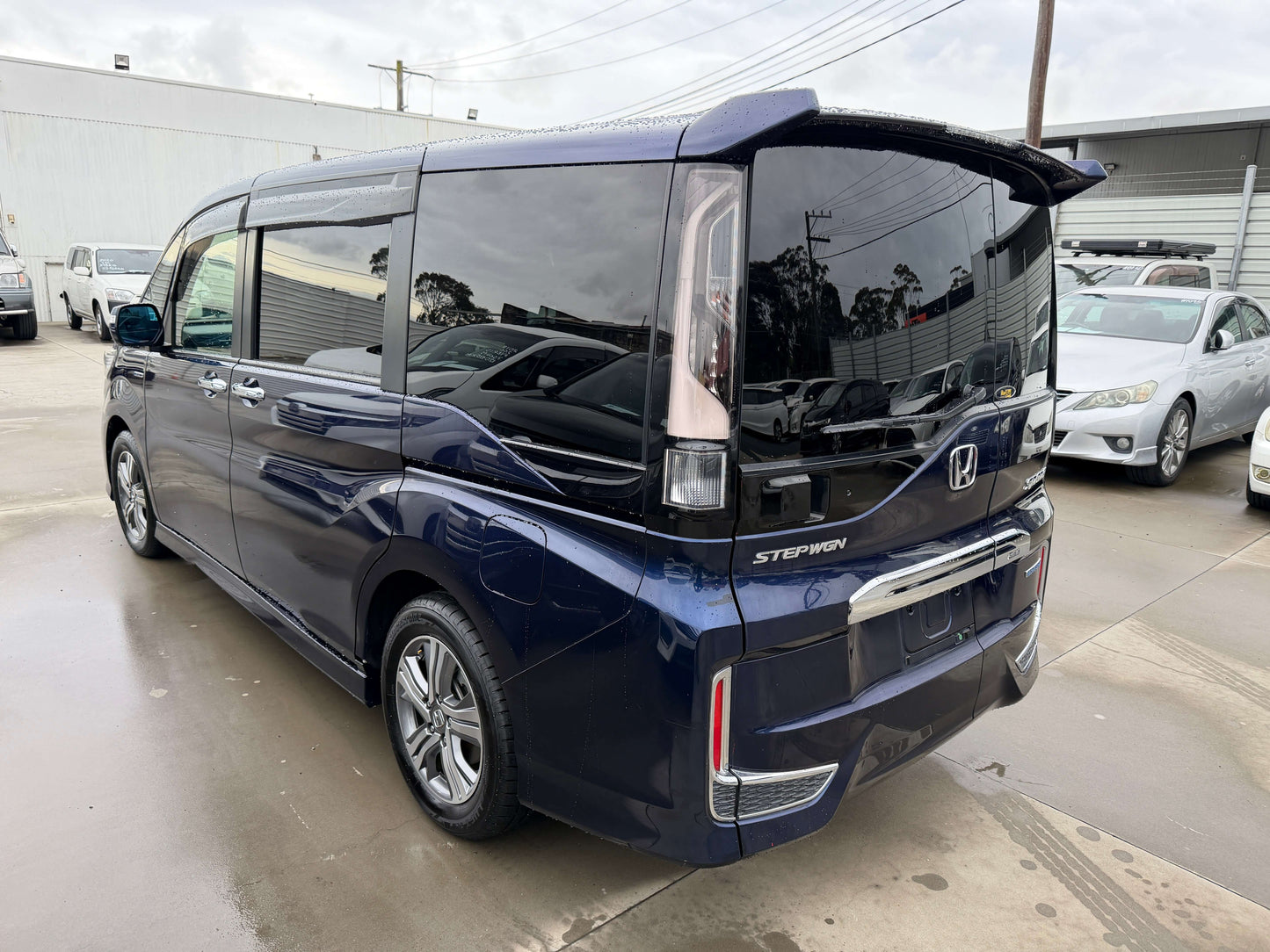 2018 Honda Honda Stepwgn 2.0 Spada Hybrid view from rear, showcasing sleek design and spaciousness.