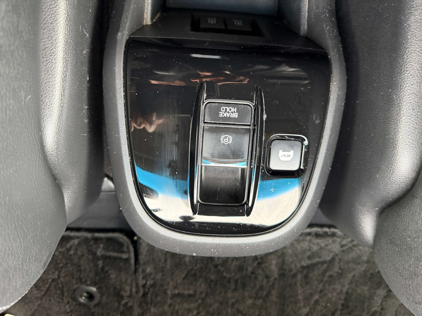 2018 Honda Honda Stepwgn 2.0 Spada Hybrid interior button controls including brake hold and parking brake.