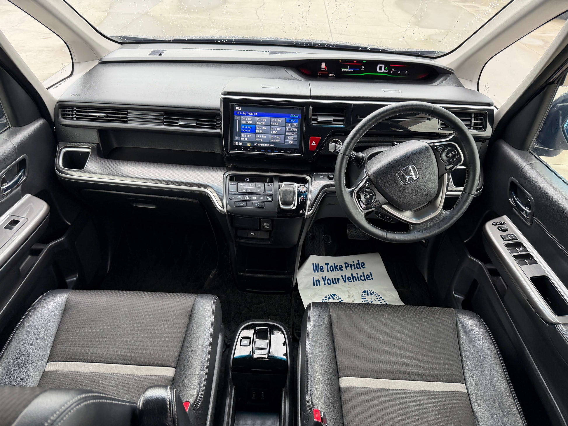 Interior view of 2018 Honda Honda Stepwgn 2.0 Spada Hybrid G with spacious seating and modern dashboard features.