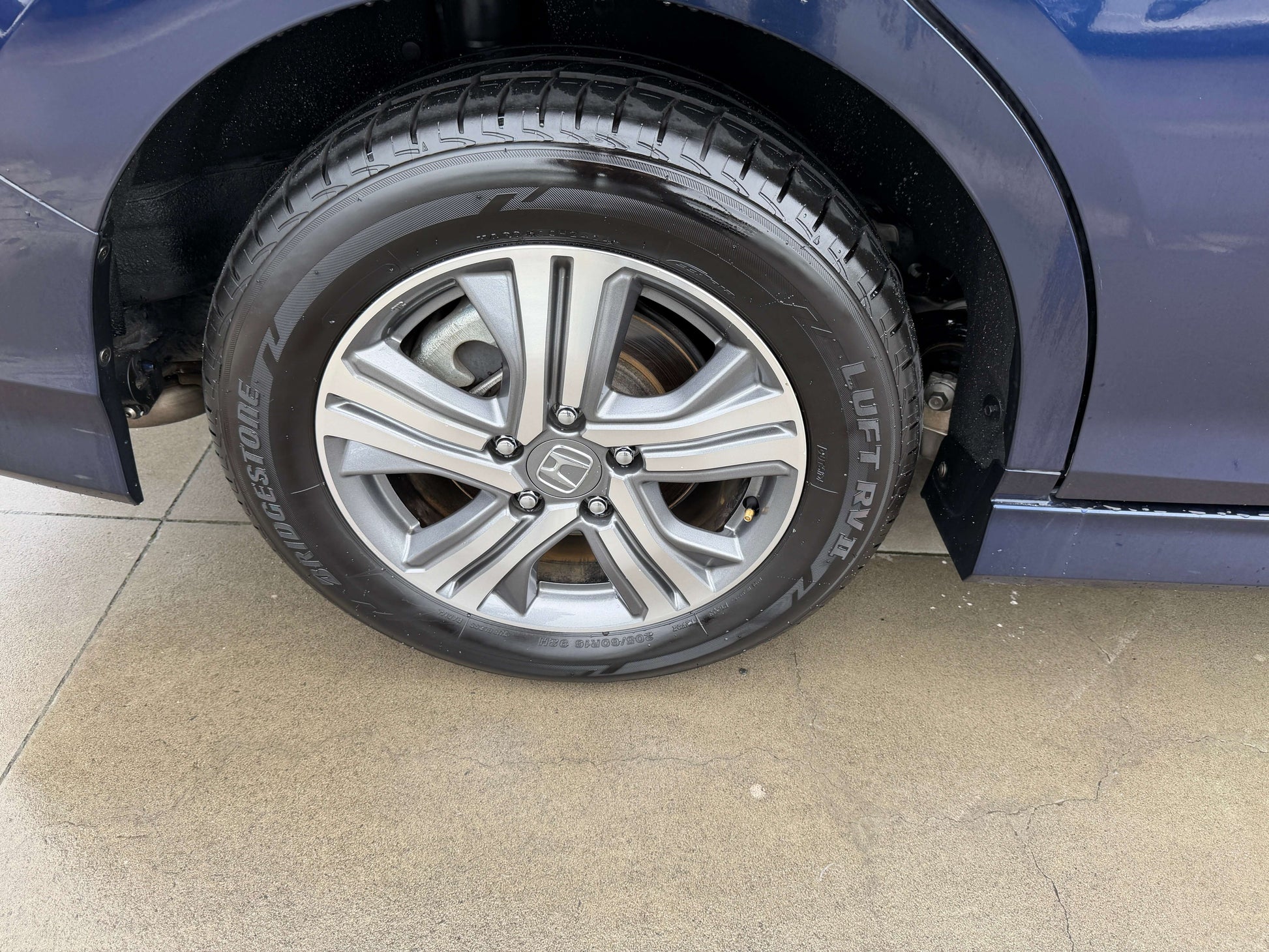 2018 Honda Honda Stepwgn 2.0 Spada Hybrid wheel with Bridgestone tire on showroom floor