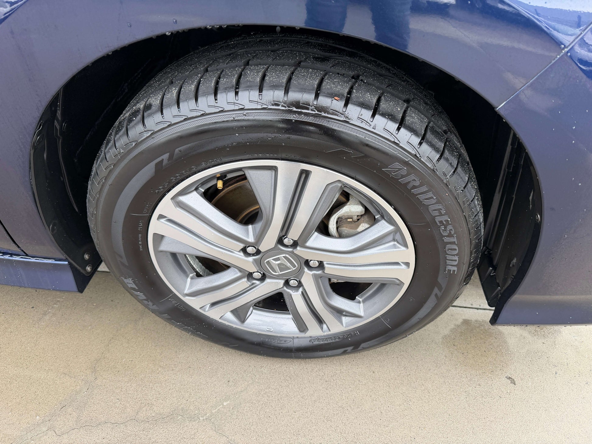 2018 Honda Honda Stepwgn 2.0 Spada Hybrid wheel close-up with Bridgestone tire.