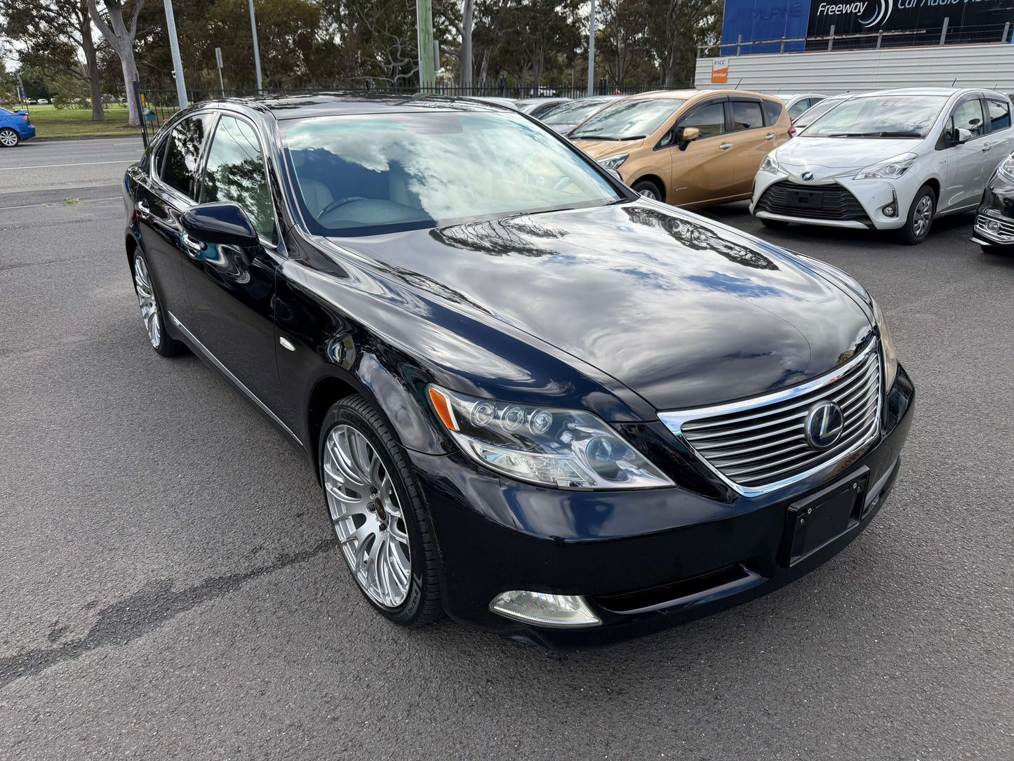 2007 Lexus LS600h AWD V8 5.0L Hybrid I Package Luxury Sedan in dark blue parked outdoors