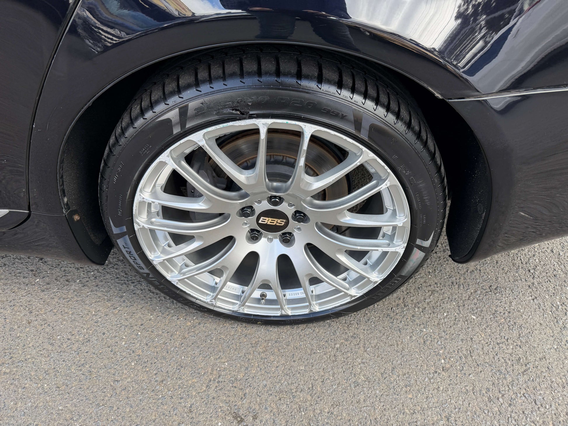 2007 Lexus LS600h AWD V8 5.0L Hybrid luxury sedan with BBS alloy wheel close-up.