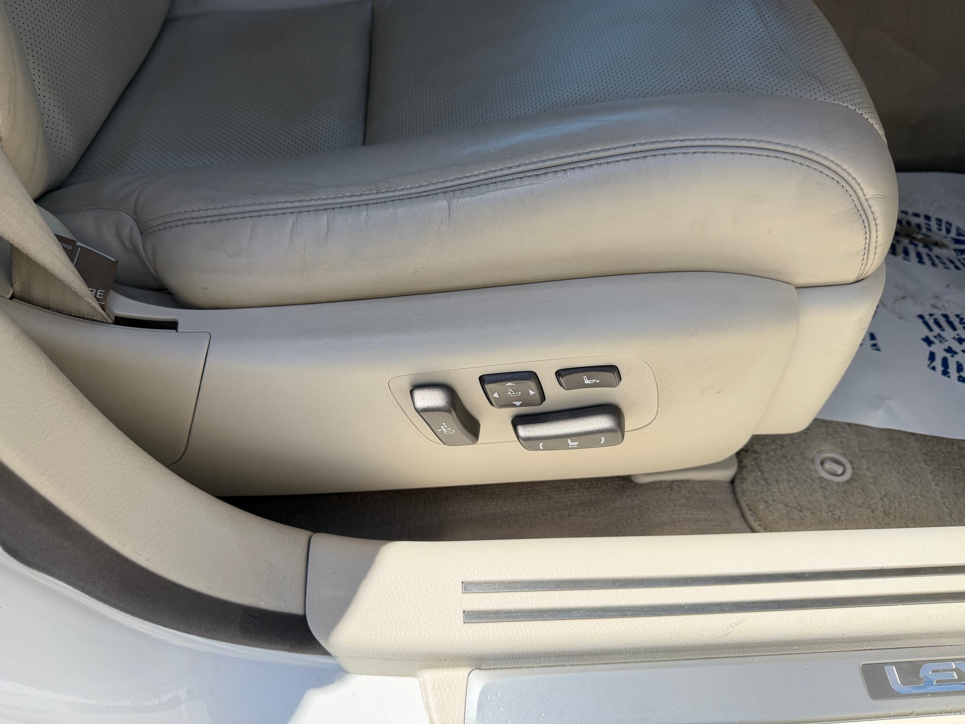 2007 Lexus LS600hL AWD V8 5.0L Hybrid luxury sedan seat adjustment controls in beige interior.