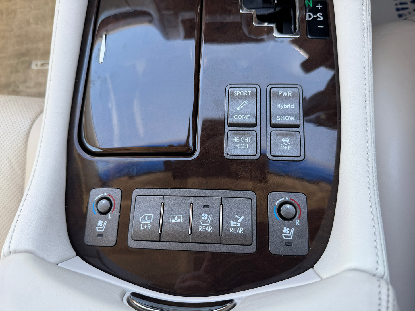 2007 Lexus LS600hL AWD V8 5.0L Hybrid interior controls with buttons for Sport, Power, Hybrid, and heated seats.