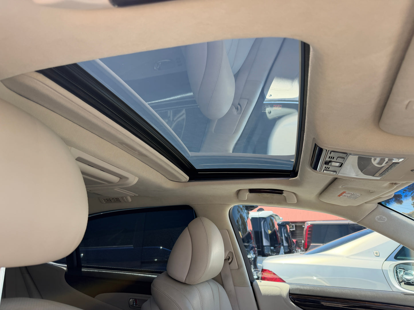 Interior view of the 2007 Lexus LS600hL AWD V8 5.0L Hybrid luxury sedan sunroof showcasing panoramic design.