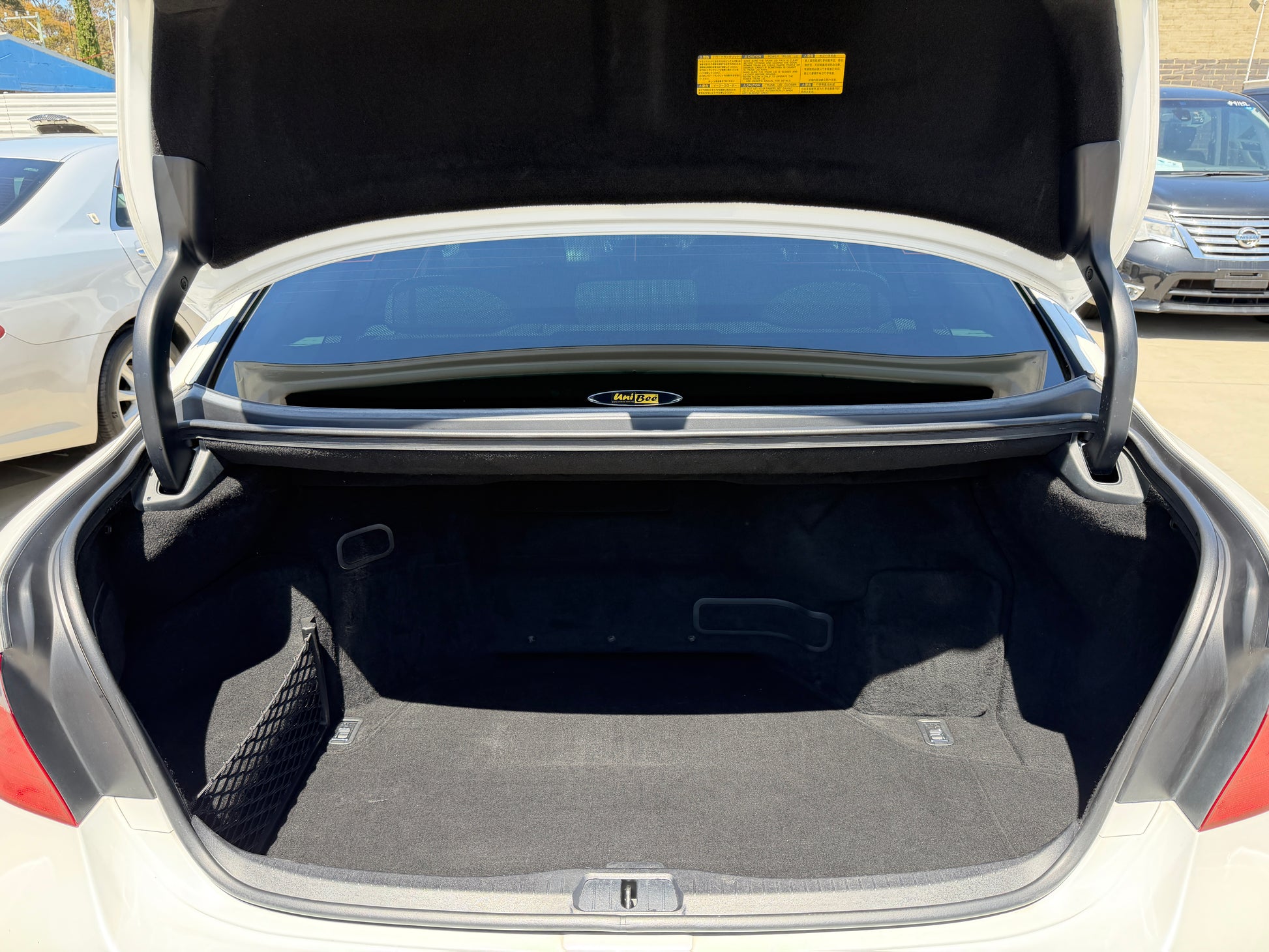 2007 Lexus LS600hL AWD V8 5.0L Hybrid luxury sedan trunk view showing ample storage space.