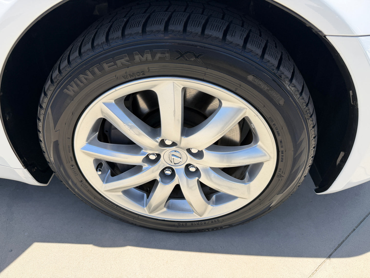 2007 Lexus LS600hL AWD V8 5.0L Hybrid luxury sedan wheel and tire close-up showing premium alloy design.