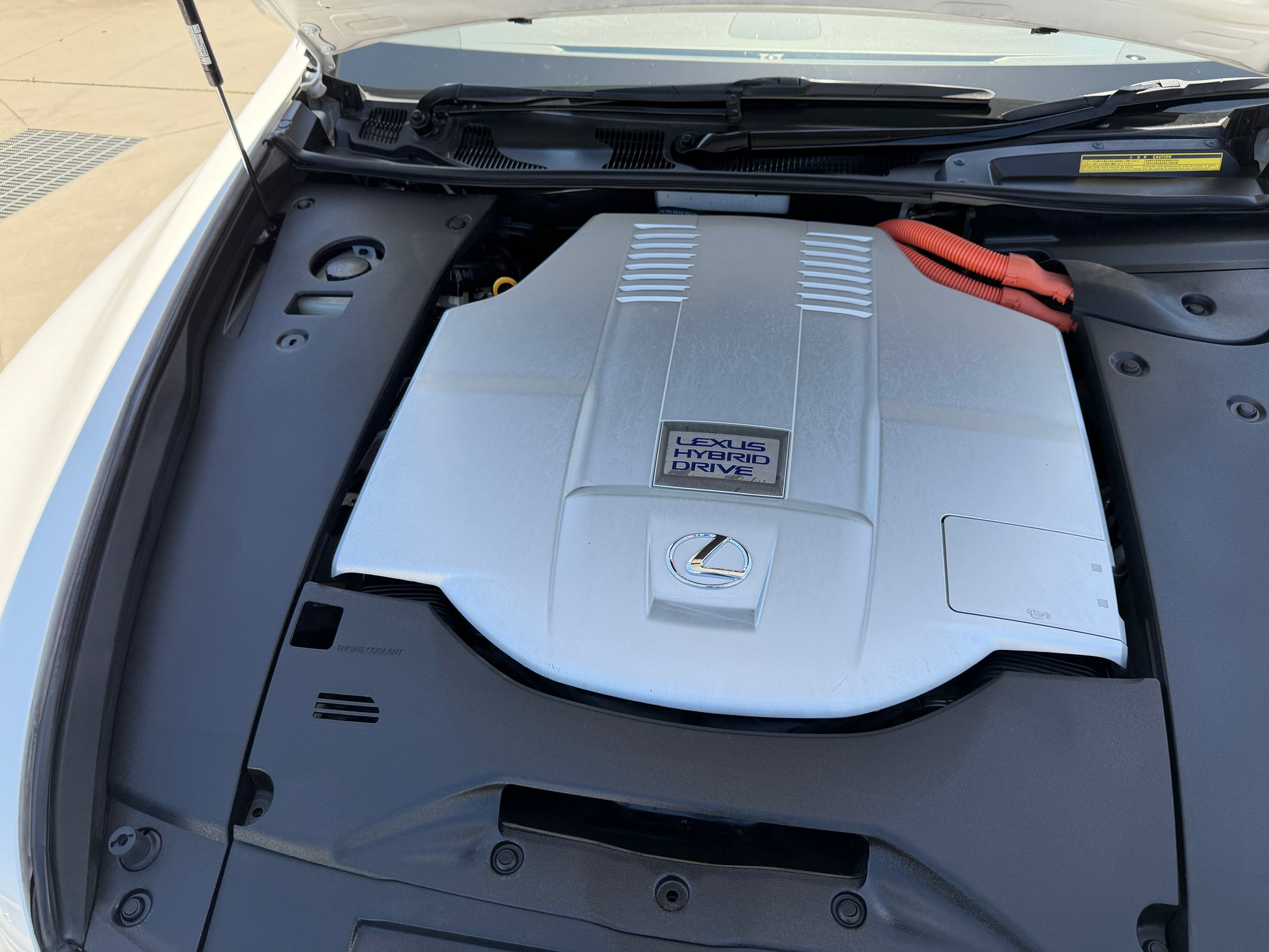 2007 Lexus LS600hL AWD V8 5.0L Hybrid engine compartment showcasing the hybrid drive system.