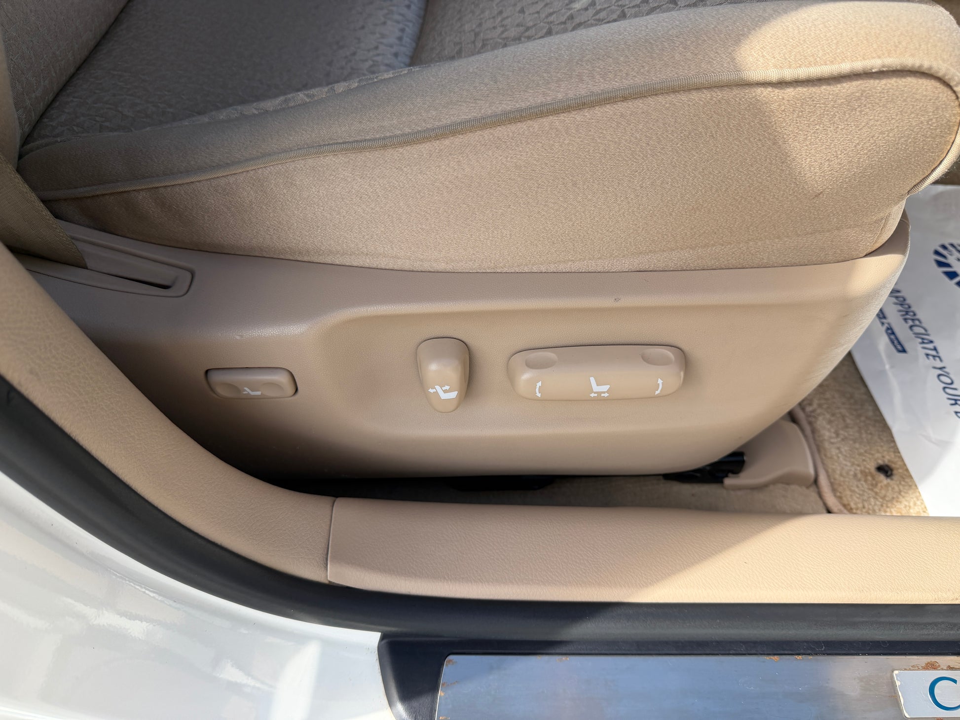 2012 Toyota Crown V6 3.5L Hybrid luxury sedan seat adjustment controls on beige leather interior