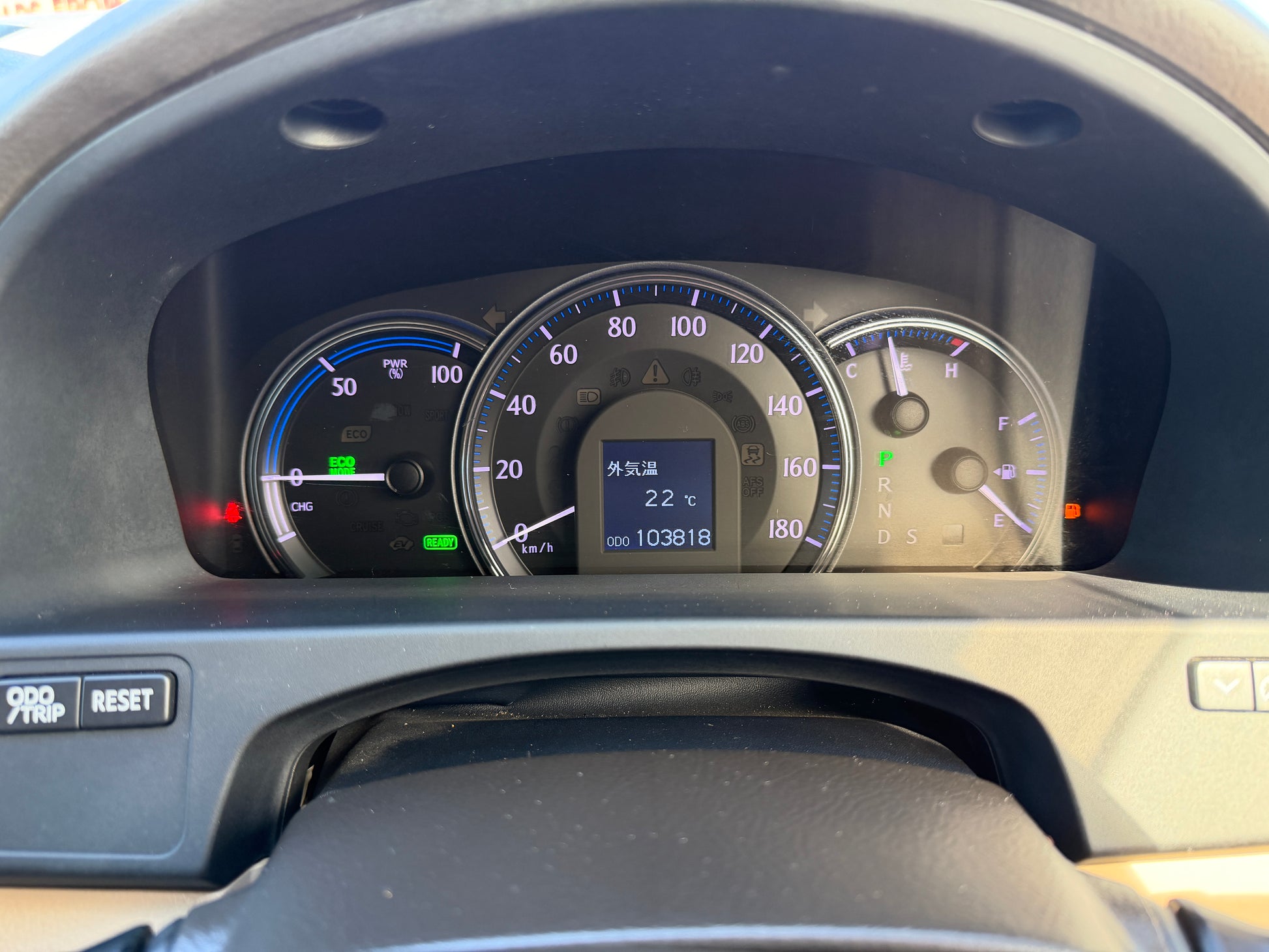 Dashboard display of 2012 Toyota Crown V6 3.5L Hybrid showing speed, fuel, and mileage at 103818 km.
