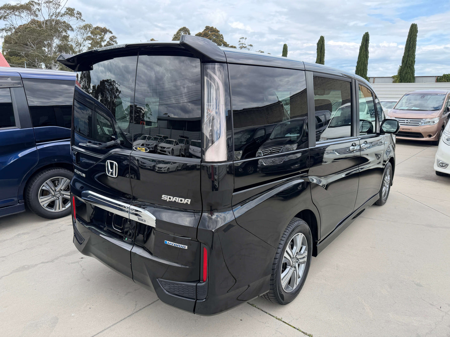 2018 Honda Honda Stepwgn 2.0 Spada Hybrid rear view showcasing sleek design and spacious features.