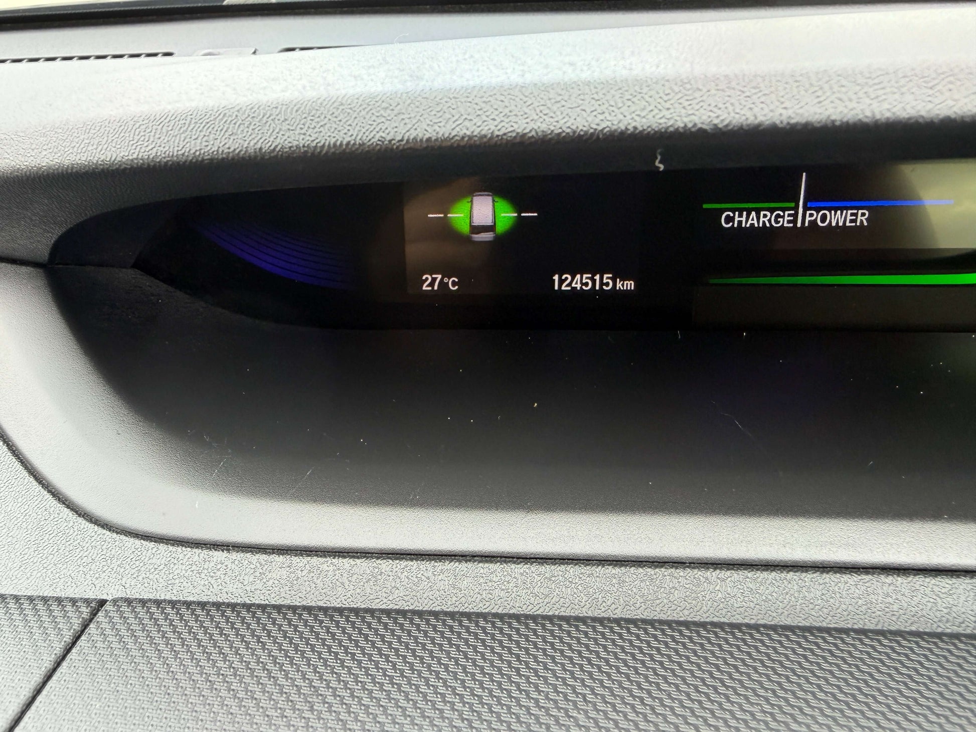 2018 Honda Honda Stepwgn 2.0 Spada Hybrid dashboard display showing 27°C temperature and 124,515 km mileage.