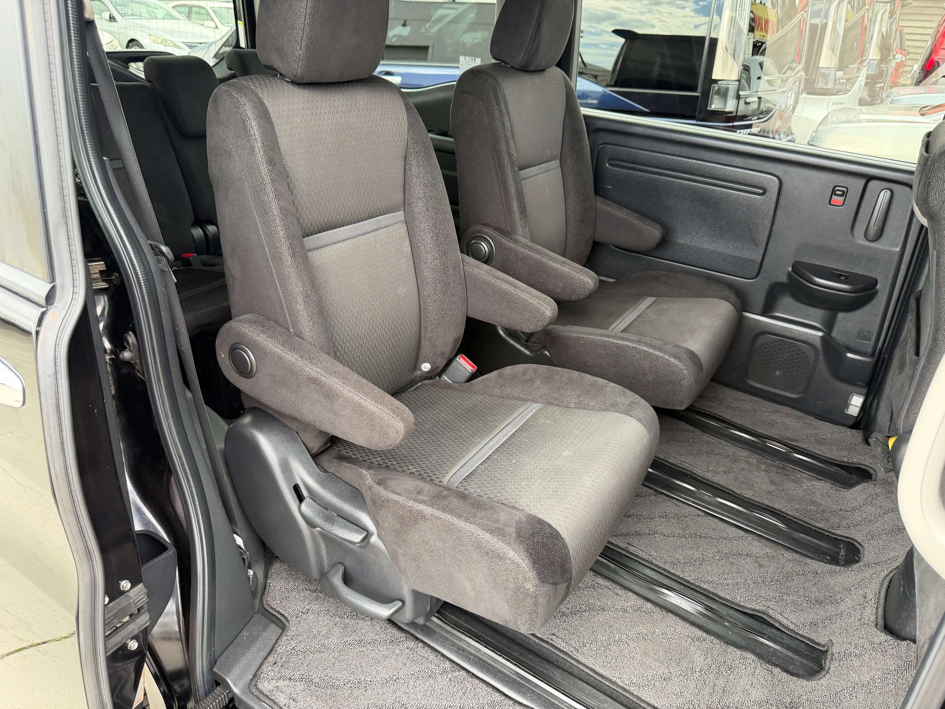 Interior seating of a 2018 Honda Honda Stepwgn 2.0 Spada Hybrid with spacious 7 seater configuration.