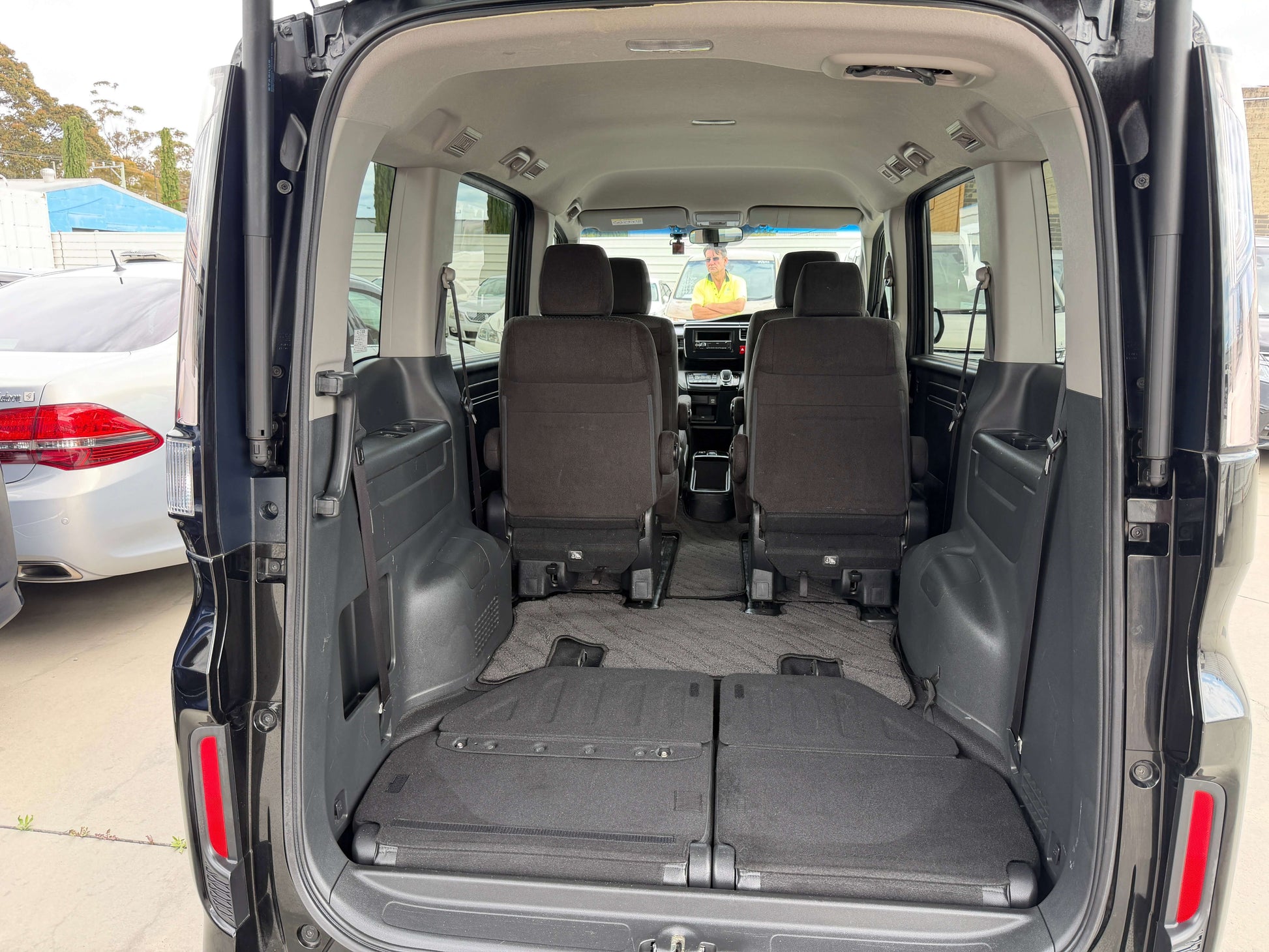 Interior view of the 2018 Honda Honda Stepwgn 2.0 Spada Hybrid with seats folded down for cargo space.