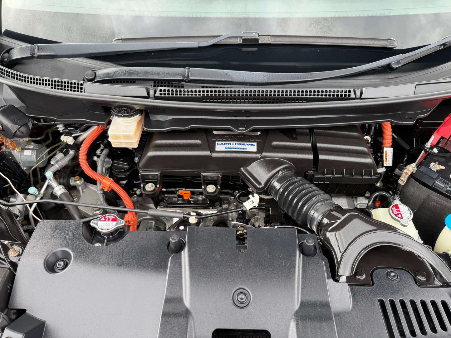 2018 Honda Honda Stepwgn 2.0 Spada Hybrid engine bay view with hybrid components and maintenance features