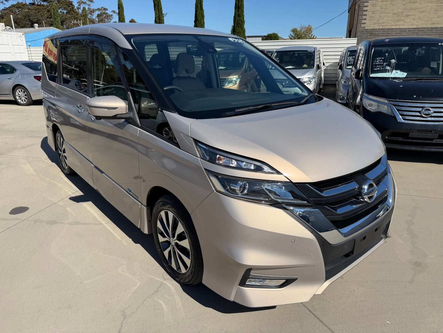 2017 Nissan Serena 2.0L S-Hybrid Highway Star Edition in a parking lot with silver exterior and modern design.