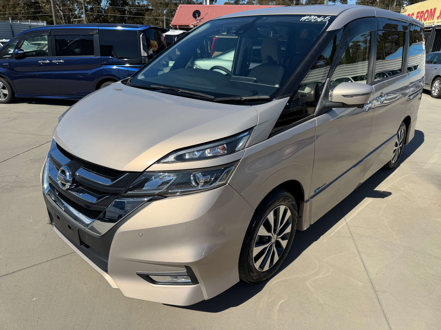 2017 Nissan Serena 2.0L S-Hybrid in light gold color, showcasing its modern design and spacious 8-seat interior.