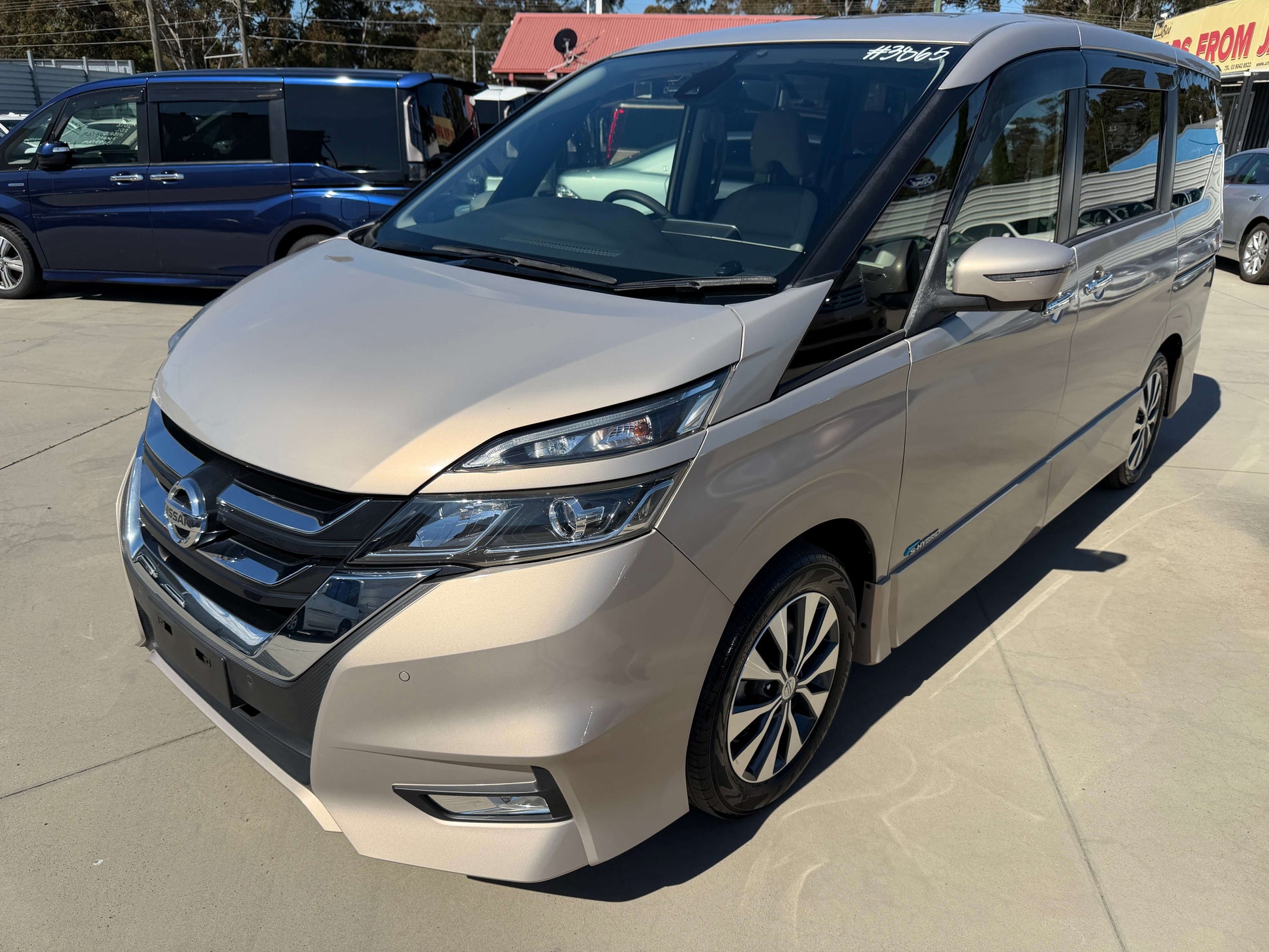 2017 Nissan Serena 2.0L S-Hybrid in light gold color, showcasing its modern design and spacious 8-seat interior.