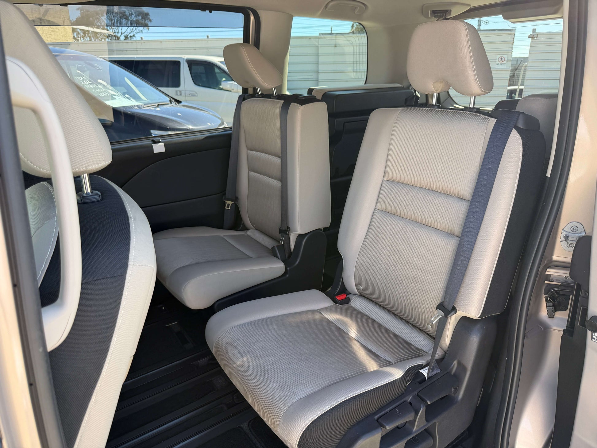 Interior view of the 2017 Nissan Serena 2.0L S-Hybrid showing spacious seating for 8 in a family-friendly layout.