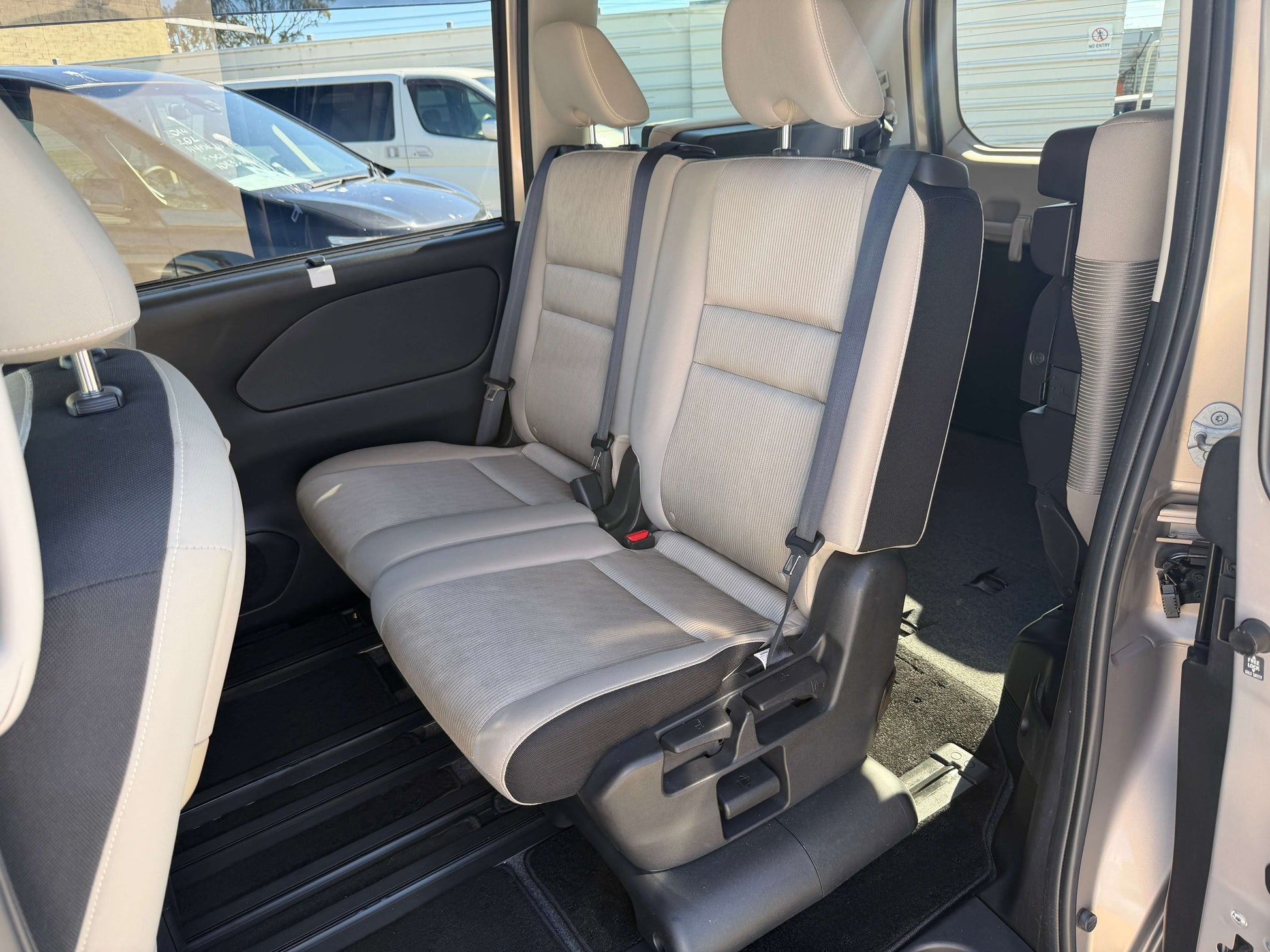 Interior seating of the 2017 Nissan Serena 2.0L S-Hybrid, spacious 8-seat configuration.