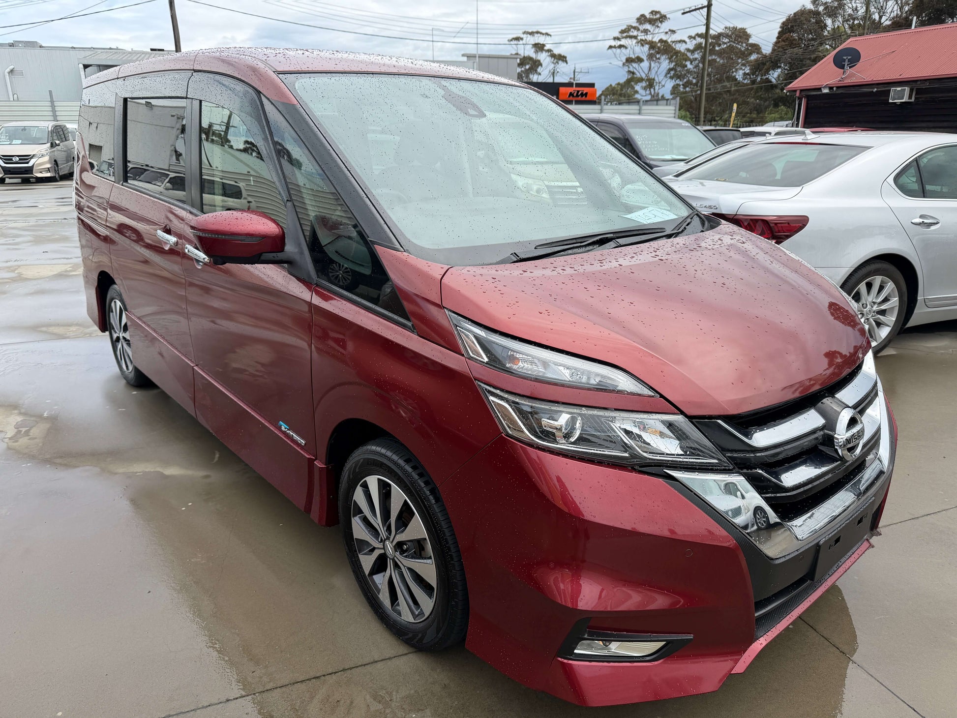 2018 Nissan Serena 2.0L S-Hybrid Highway Star Edition in red, showcasing exterior design and features.