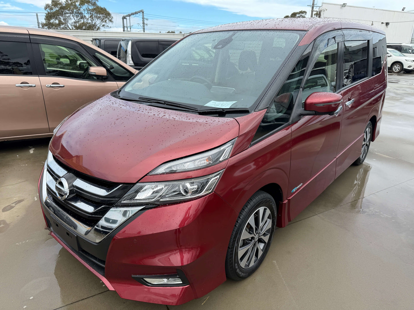 2018 Nissan Serena 2.0L S-Hybrid Highway Star Edition in red color parked outdoors
