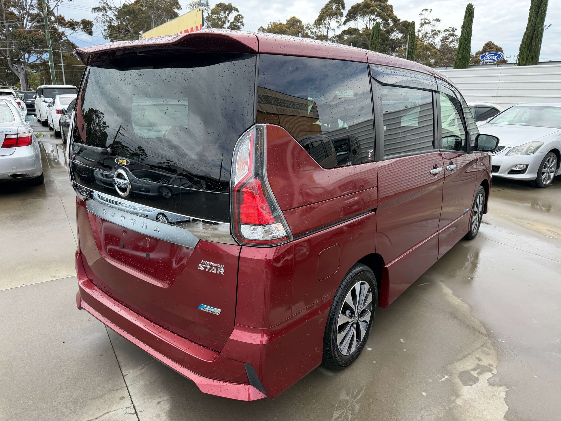 2018 Nissan Serena 2.0L S-Hybrid Highway Star Edition maroon rear view with 8 seats.