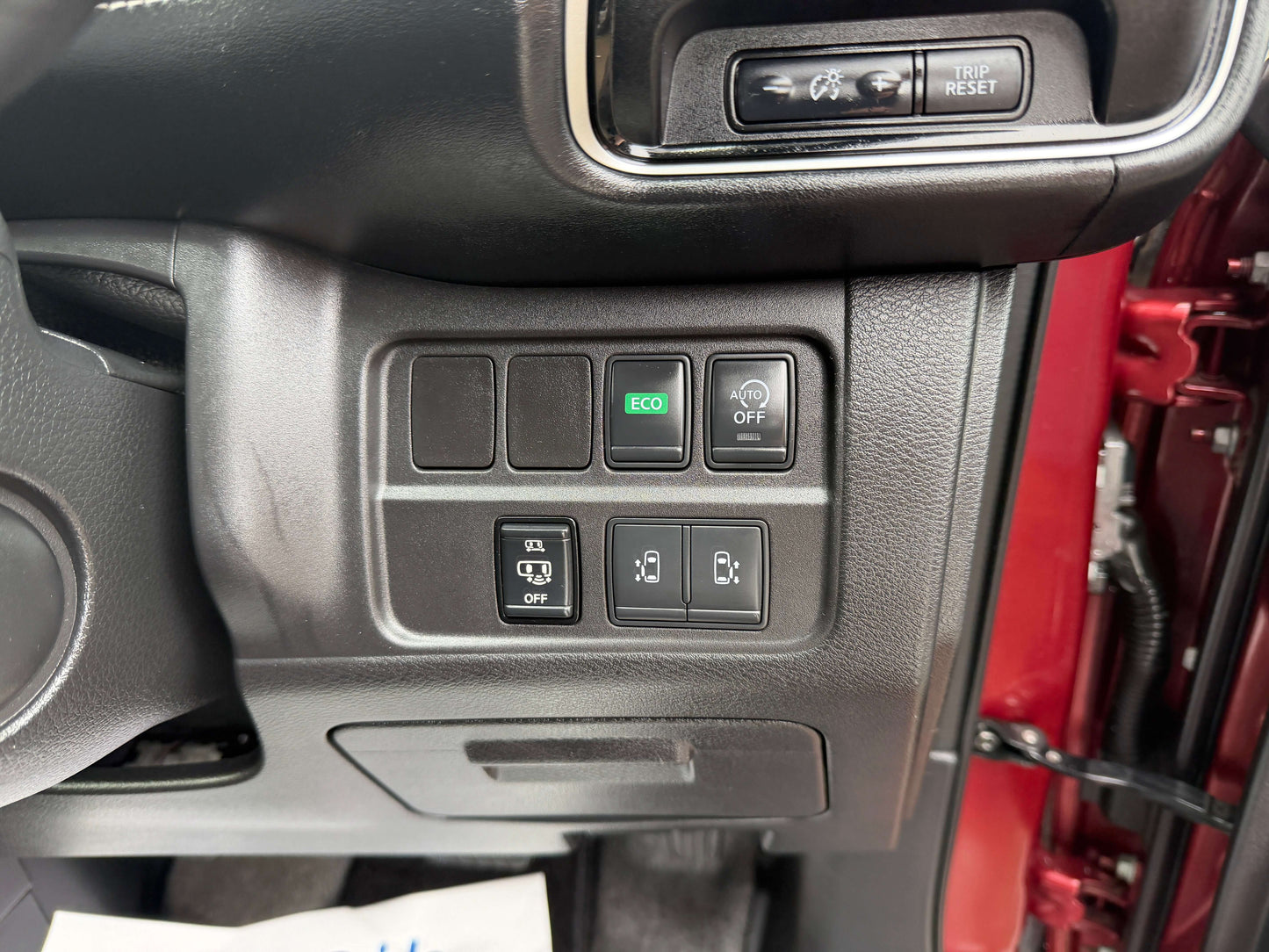 Interior dashboard controls of 2018 Nissan Serena 2.0L S-Hybrid Highway Star Edition, including eco and safety buttons.