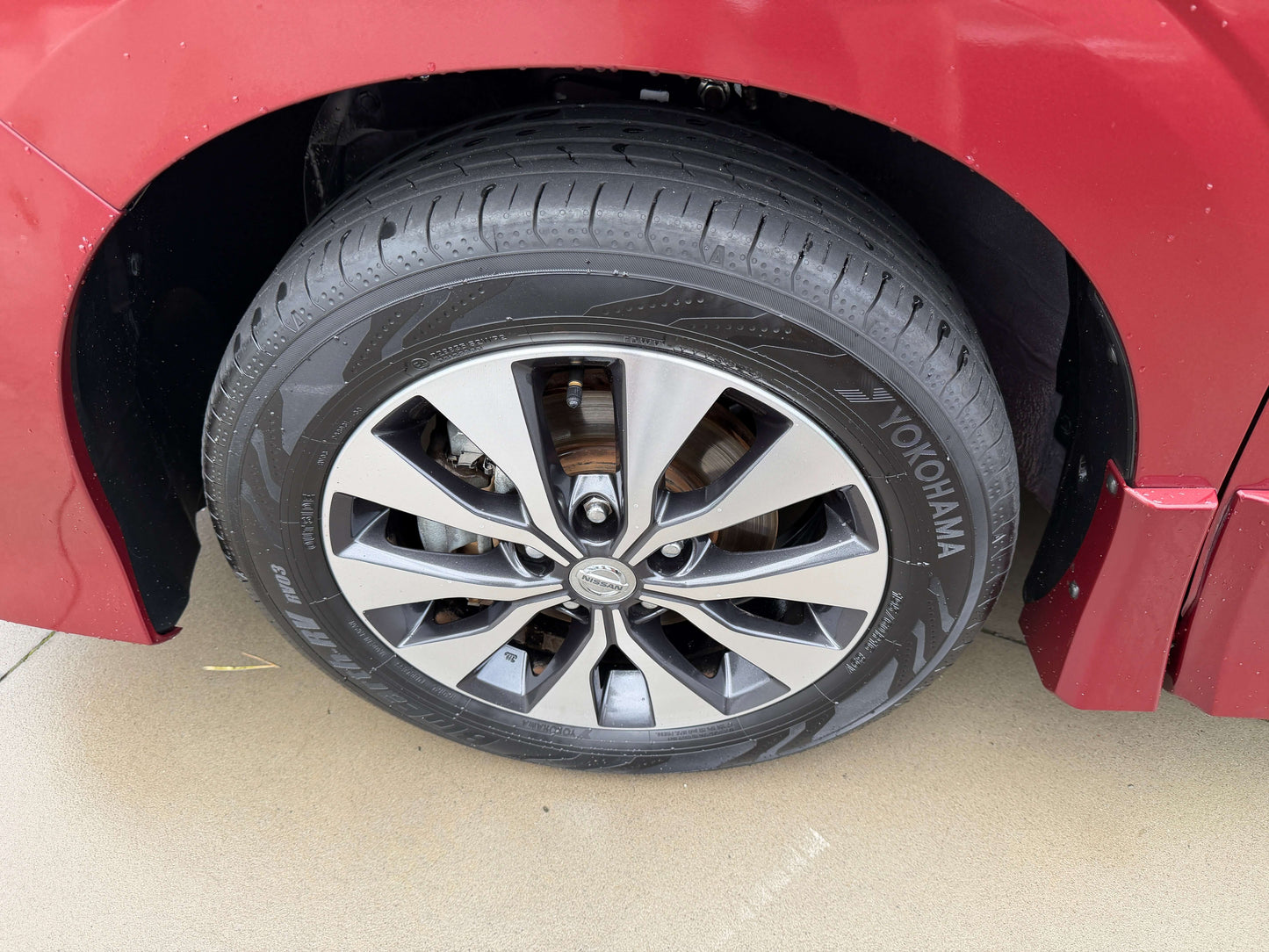 Close-up of the tire and alloy wheel of a 2018 Nissan Serena 2.0L S-Hybrid Highway Star Edition.
